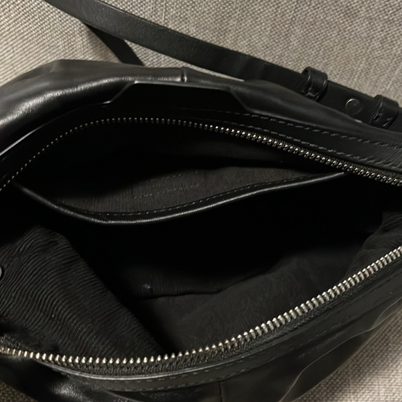 NWOT 

Rag & Bone black leather crossbody. Not worn. 10 by 7. Strap 19-22. - Picture 5 of 9